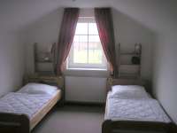 Ferienwohnung Juniweg I in Alt Schönau Schlafzimmer